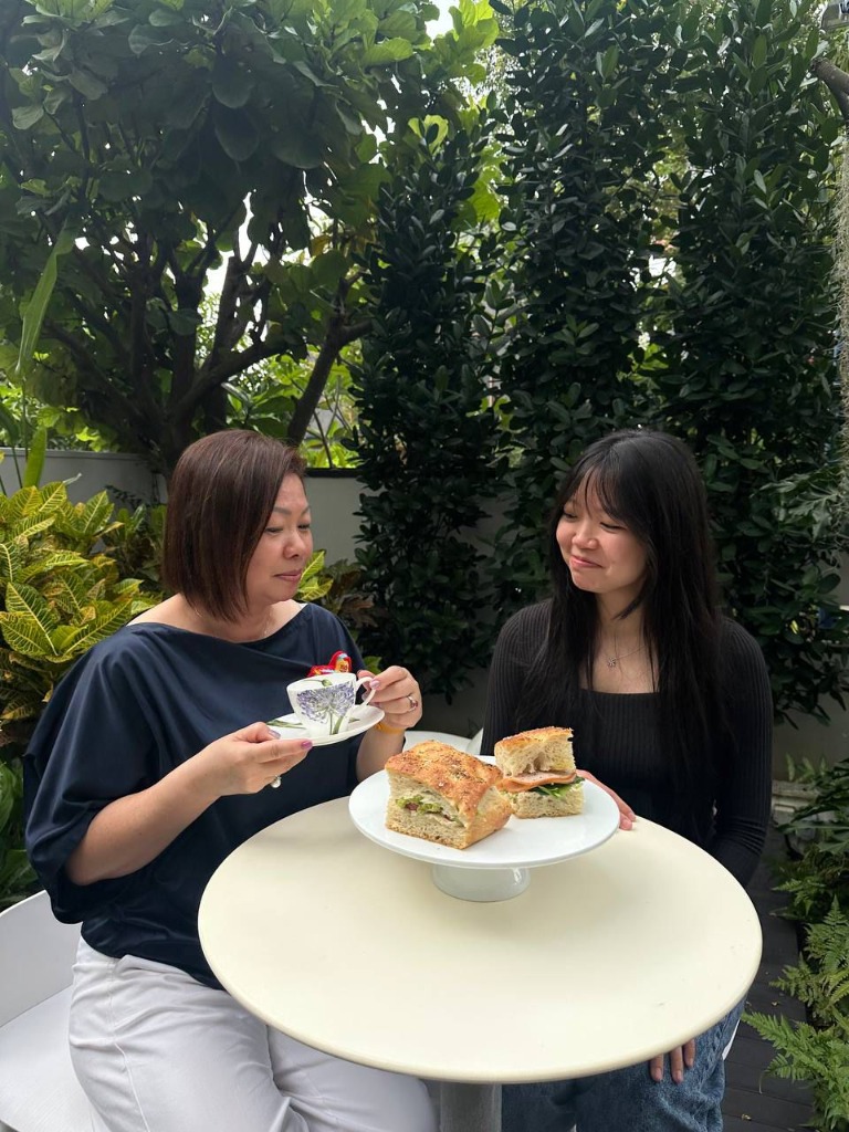 Enjoying coffee and sandwiches