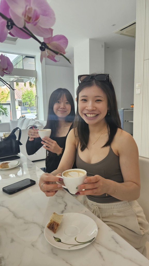 Friends enjoying a latte in the cafe