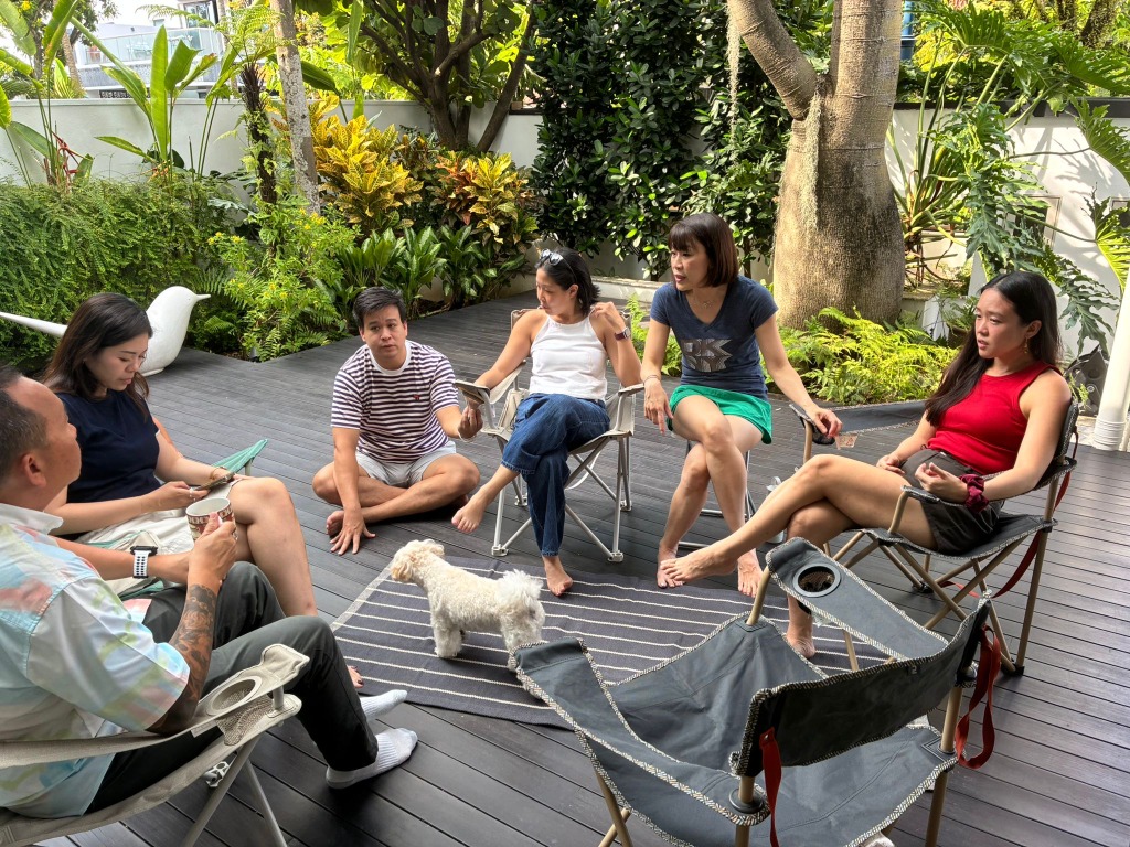 Group of friends gathering outside the cafe
