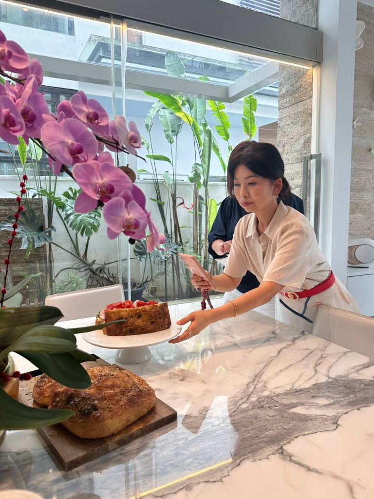 Snapping a beautiful photo of the cafe food